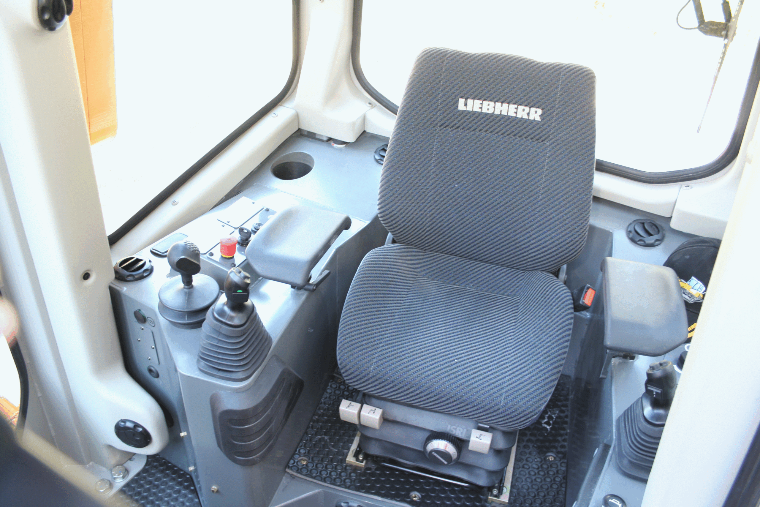 inside view of a cabin on liehberr pipelayer with 15 degrees turned operator seat